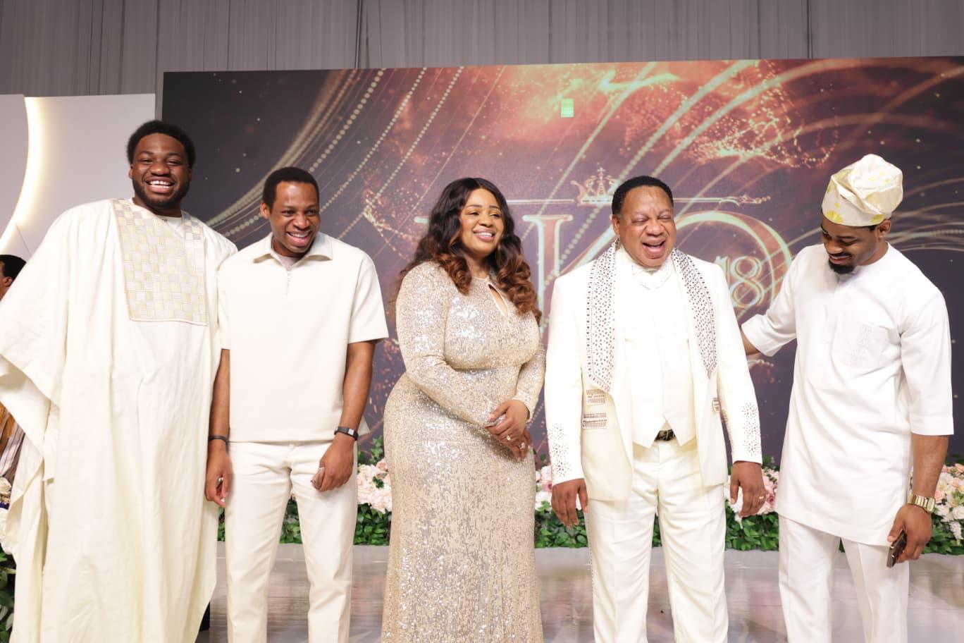 A joyful family moment with Reverend Ken