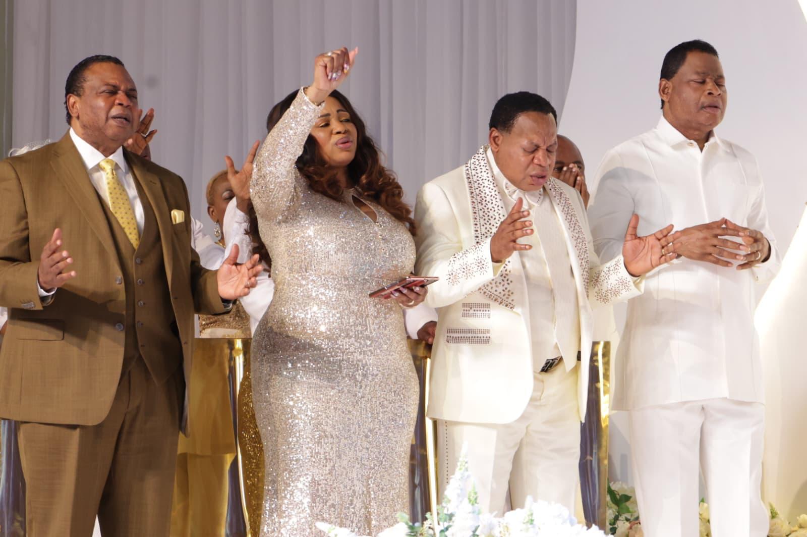 Reverend Ken sharing a worship moment with family and friends